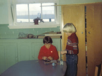 Me and Simon Briggs making things in the school dining room, 1980. Good view of the A1 footbridge through the window