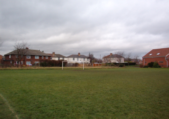 The cricket/football field, 2007. The swings I fell off had disappeared and the village hall appeared to have been rebuilt, but otherwise it was just as I remembered it